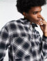 ADPT oversized boxy flannel check overshirt in black