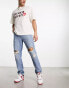 ASOS DESIGN straight leg jeans with rips in vintage light wash