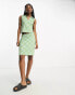 Weekday Phoebe co-ord sleeveless polo top in green and blue check pattern