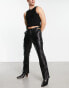 ASOS DESIGN bootcut trousers in leather look with cut out sides in black - BLACK