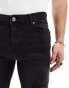 ASOS DESIGN skinny jeans in black with knee rips and zip detail