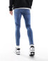 ASOS DESIGN spray on jeans with power-stretch in dark wash blue