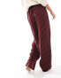 ASOS DESIGN basic pull on trouser in burgundy stripe