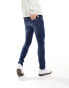 ASOS DESIGN skinny jeans in mid wash blue