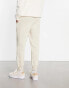 Puma essentials small logo joggers in off white