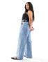 ASOS DESIGN Curve mid rise baggy boyfriend jeans in mid blue