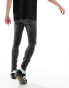 ASOS DESIGN spray on jeans with power-stretch with rips in washed black