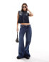 Monki Kiri low waist loose fit flared jeans in dark blue wash