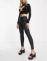 River Island Molly mid rise coated skinny jean in black