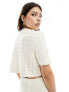 ASOS DESIGN knitted polo top with stitch detail in cream