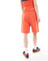 COLLUSION oversized longline sports short in red