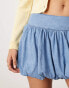 ASOS DESIGN denim puff skirt in lightwash blue