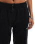 The North Face Essential logo oversized joggers in black