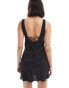 Bershka tie back mini dress in black and white spot