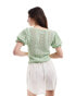 ASOS DESIGN lace up stitched top with puff sleeves in green