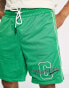 The Couture Club co-ord mesh varsity shorts in green with racer print