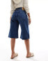 Monki Paige low waisted loose denim jorts in mid wash blue