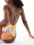 ASOS DESIGN lattice strap swimsuit with high leg in vibrant abstract print