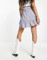 ONLY ruffle wrap mini skirt in lilac floral