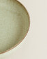 Porcelain soup plate with antique finish rim