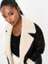 4th & Reckless longline contrast faux shearling coat in black and cream