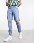 ASOS DESIGN tapered fit jeans with busted knees in mid wash blue - MBLUE