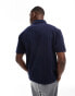 ASOS DESIGN relaxed polo with wide set rib in navy