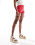 SNDYS embossed knitted shorts in red