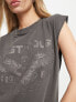 ASOS DESIGN washed oversized tank with drop arm hole with lost tour rock graphic in washed charcoal