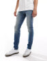 ASOS DESIGN skinny jeans in dark wash blue