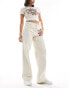 JDY high waist wide leg jeans with front pleat in ecru