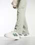 New Balance CT302 trainers in white & green