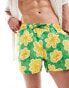 ASOS DESIGN swim shorts in short length in green floral print