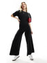 ASOS DESIGN ruched side jumpsuit with wide leg in black