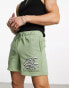 Coney Island Picnic co-ord jersey shorts in green with lost mind print