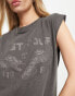 ASOS DESIGN washed oversized tank with drop arm hole with lost tour rock graphic in washed charcoal