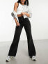 COLLUSION x008 mid rise relaxed flare jeans in washed black