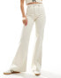 & Other Stories stretch high waist flared leg jeans with double belt loop detail and patch pockets in off white