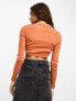 Calvin Klein Jeans label tight crop v-neck sweater in burnt clay