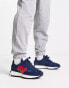 New Balance 327 trainers in navy and red