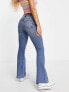 Miss Selfridge flare jean in mid wash