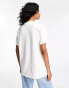 ASOS DESIGN oversized t-shirt with surfing graphic in white