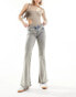 Monki Katsumi low rise flared leg jeans in beige tint