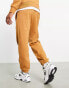 New Balance Athletics State Sweatpant in tan