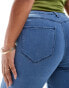 ONLY Curve push-up skinny jeans in mid blue