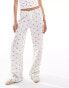 ASOS DESIGN strawberry ditsy wide leg trousers in white