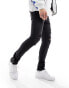 ASOS DESIGN skinny jeans in black with knee rips and zip detail