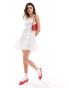 Wednesday's Girl textured shirred mini smock dress in white