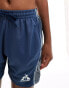 Le Coq Sportif Paris 2024 Olympics training shorts in blue