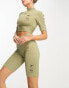 Nike Sport Utility rib legging shorts in neutral olive